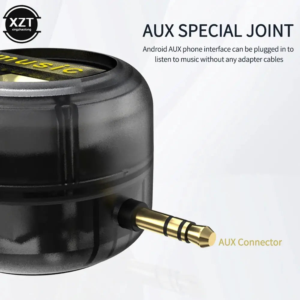 Mini portable speaker in black with gold 3.5mm AUX plug
