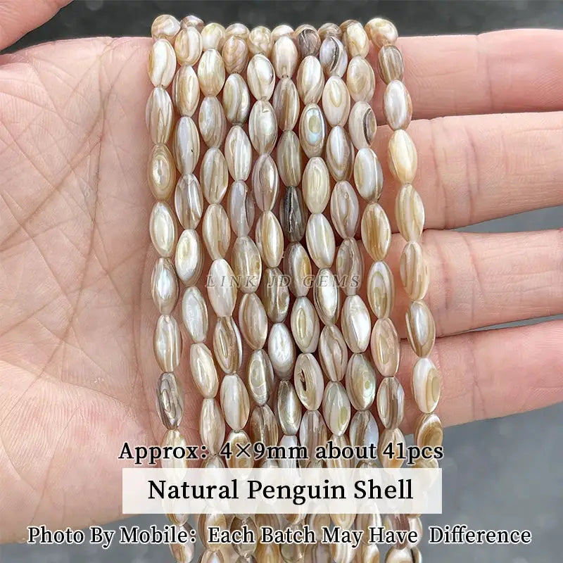 Natural shell beads, irregular oval shapes with creamy beige and iridescent stripes, 4x9mm, 41pcs