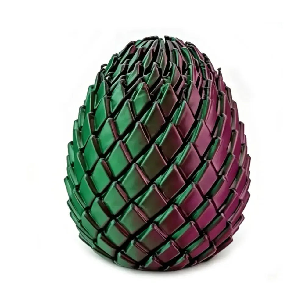 3D-printed dragon egg stress-relief model with interlocking scales in green-purple gradient, deformable desk ornament.