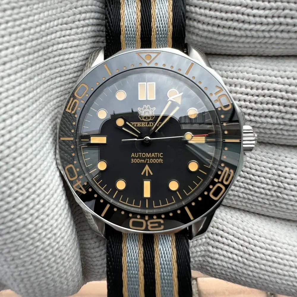 Steeldive SD1957 dive watch, 42mm ceramic bezel, black dial with gold lume, NH35 auto, 300m water, striped NATO strap