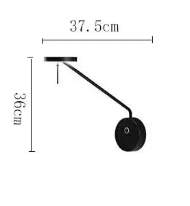 Creative LED Chandelier black lustre wall lamp with adjustable angled arm and round base.