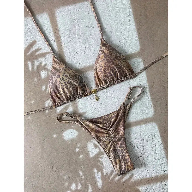 Leopard print bikini set by Simples Market with triangle push-up top and thong bottoms, two-piece swimsuit for women