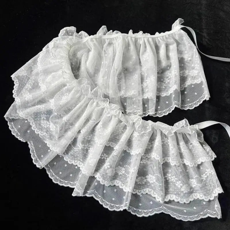 Lace-layered gauze skirts, white, with ruffled lace trim; two-piece set.