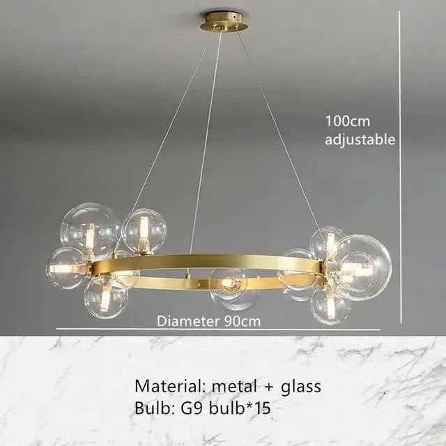 Gold metal and glass chandelier with a circular ring and glass globes, 90 cm diameter, 100 cm adjustable cord.