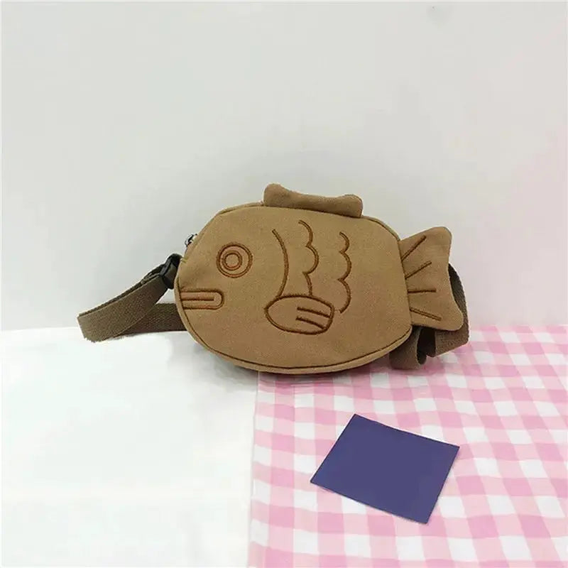 Fish-shaped canvas crossbody bag in brown with embroidered outline, Simples Market zippered small purse