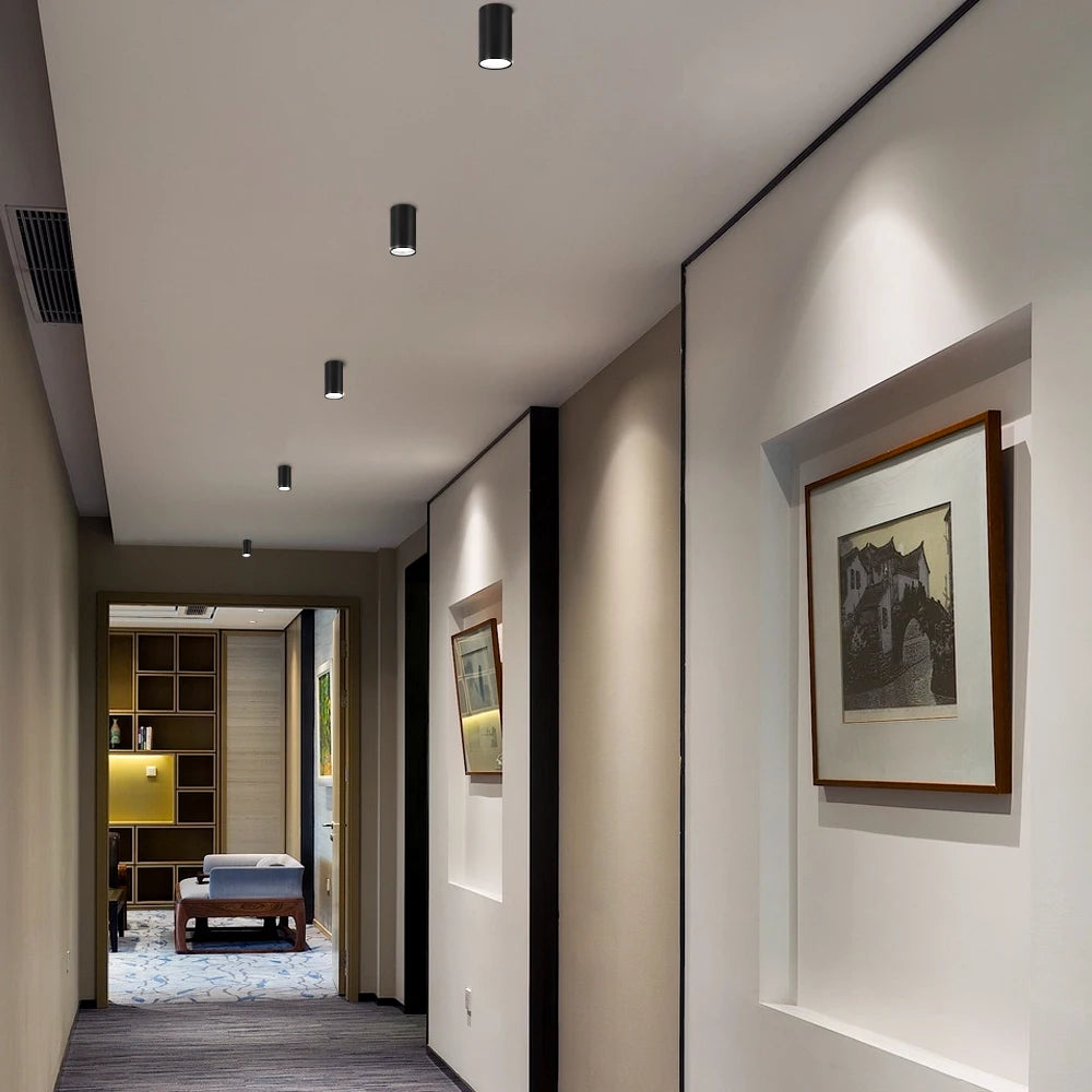 GU10 LED downlight ceiling spotlight; black cylindrical fixtures along a hallway