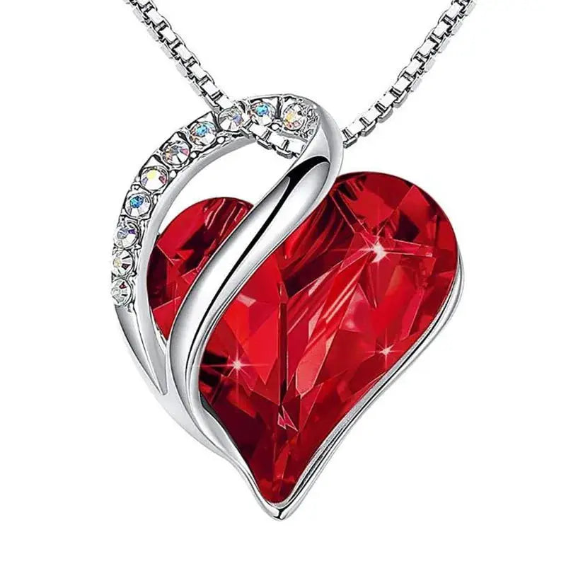 Simples Market heart pendant necklace with red crystal heart and rhinestone-accented silver setting