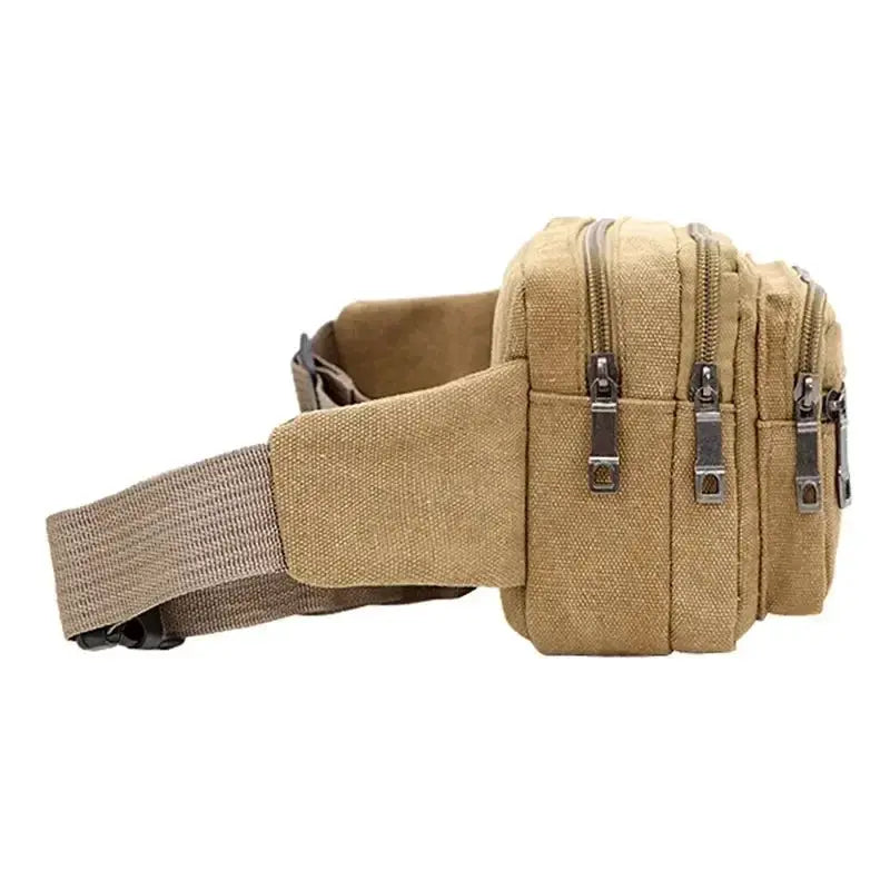 Tan canvas waist bag with multiple zip pockets and adjustable strap