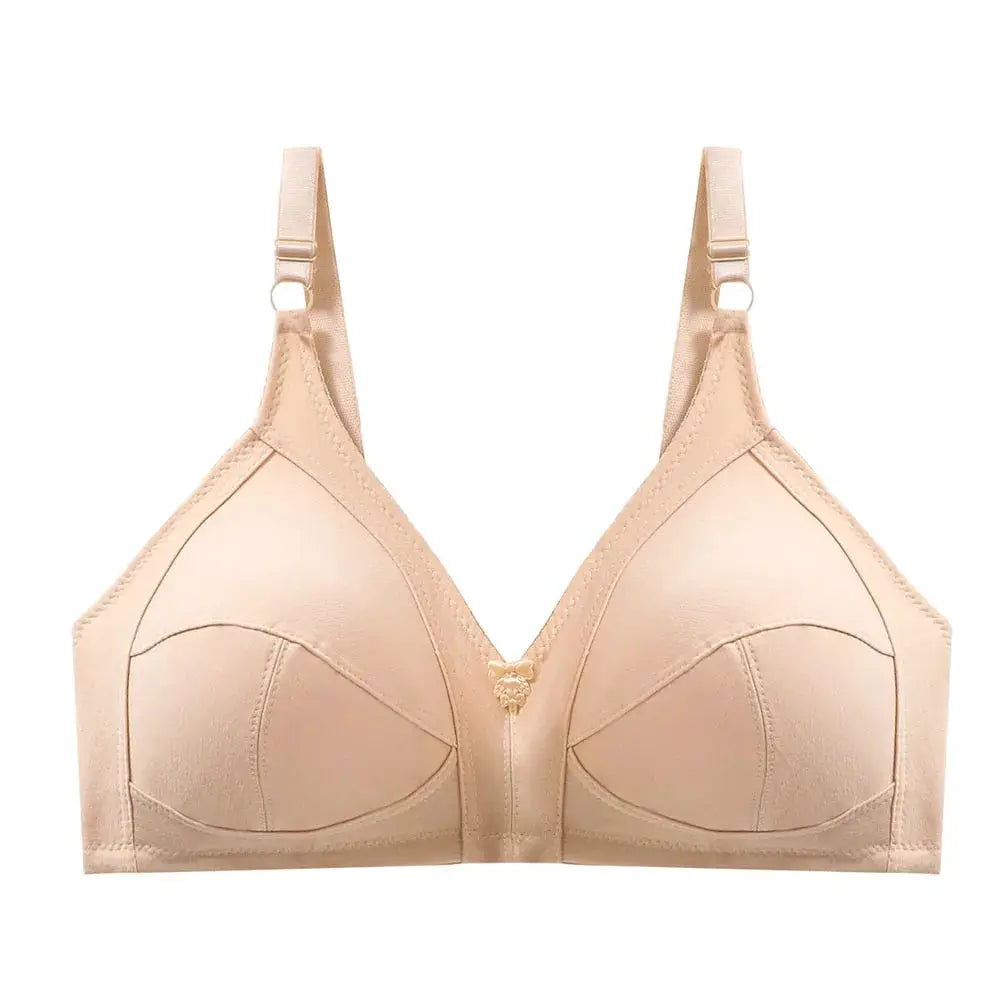 Plus size nude bra with seamless molded cups, adjustable straps, and a center bow