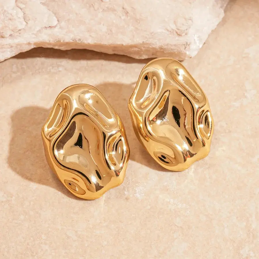 Gold irregular pleated oval acrylic stud earrings, pair of geometric ear studs