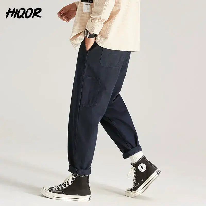 HIQOR cargo pants navy with multiple pockets, belt loops, and rolled cuffs.