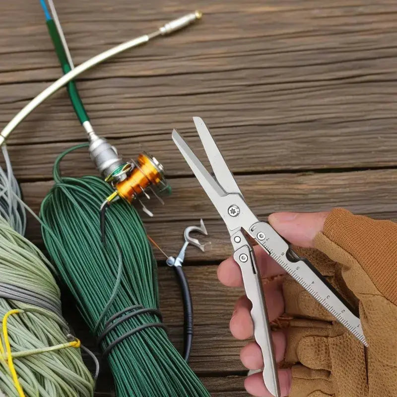 Portable folding scissors by Simples Market, stainless steel outdoor survival tool for camping and fishing.