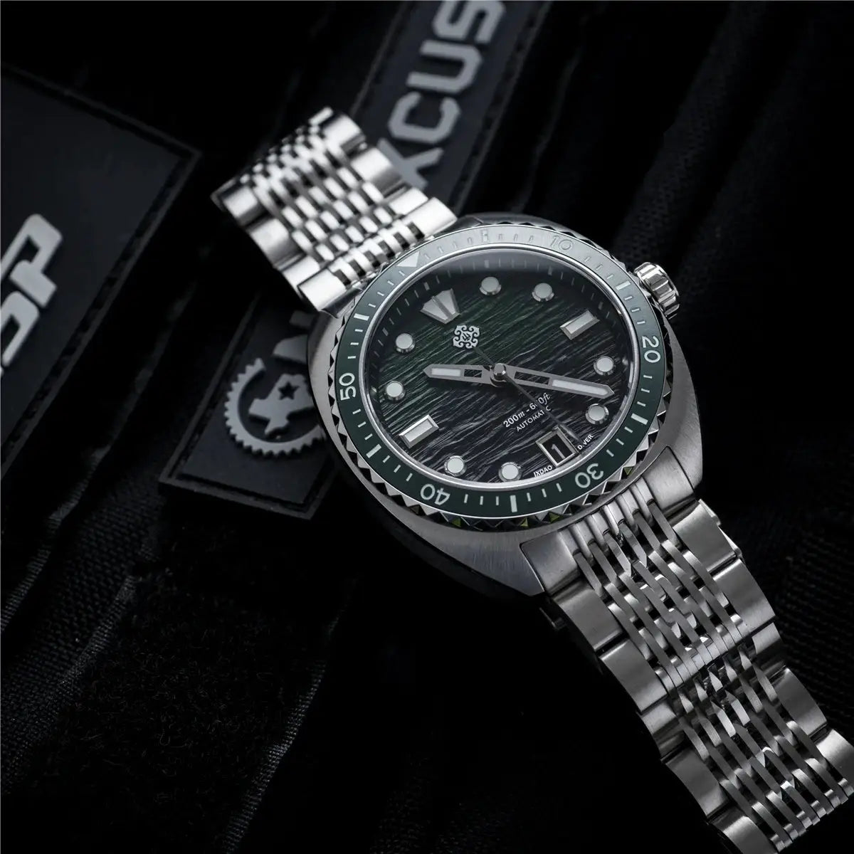IXDAO IPOSE 2026 men's automatic diving watch with green textured dial, 200m water resistant, stainless steel bracelet
