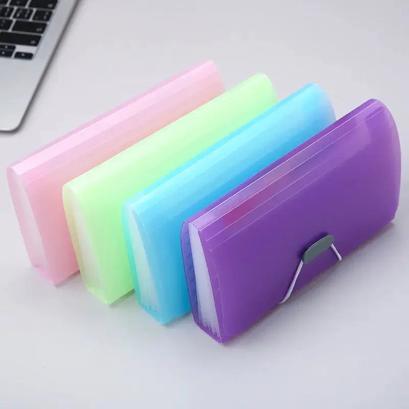 A6 expanding file folders with buckle wallets, four pastel colors: pink, lime, blue, and purple.