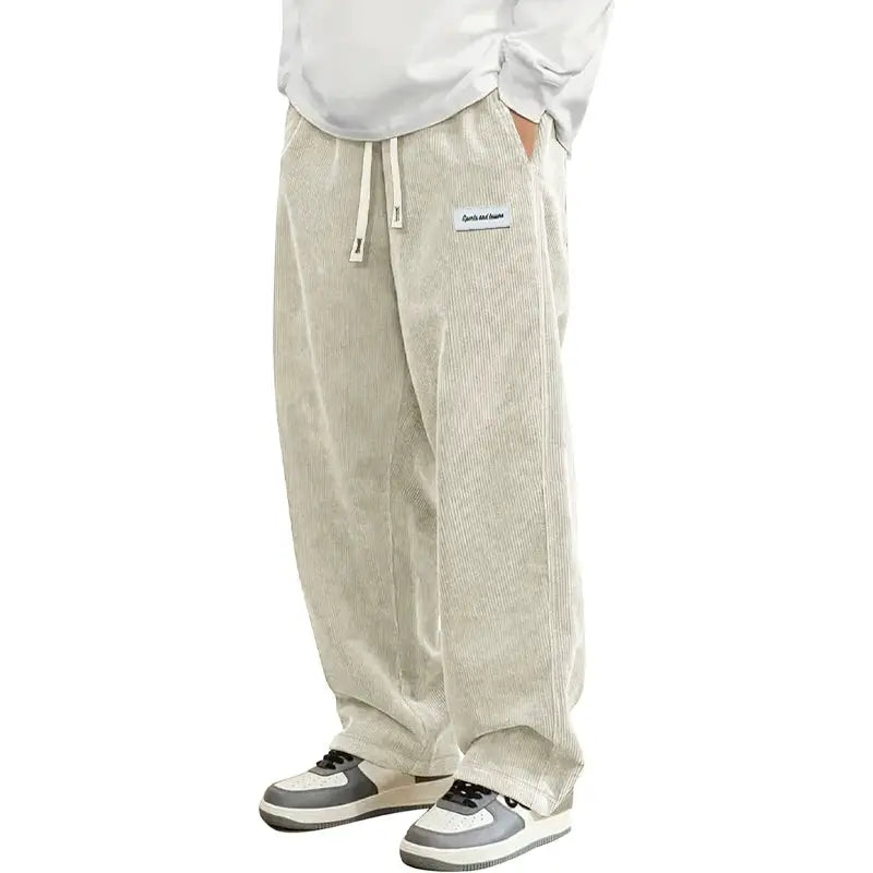Mens corduroy casual pants with elastic drawstring waist, loose baggy straight fit in beige