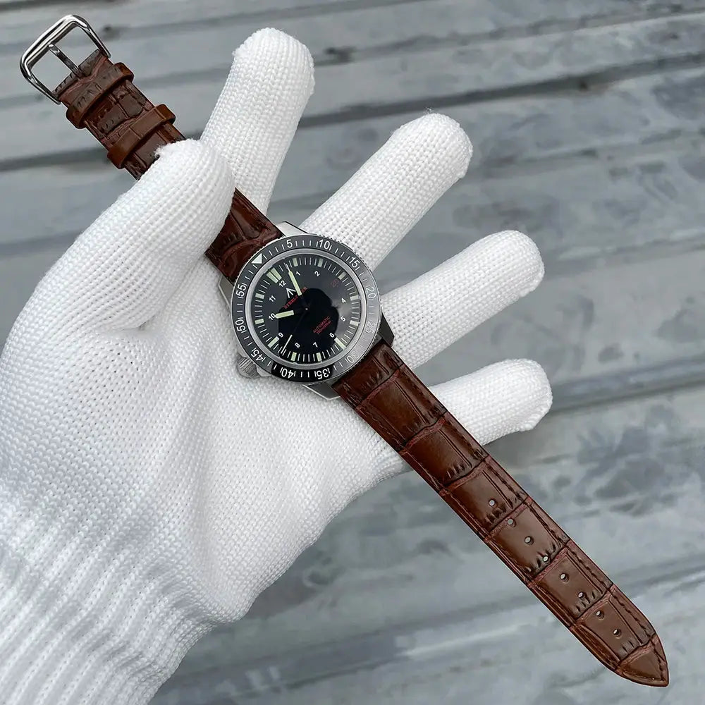 STEELFLIER SF783 automatic dive watch with brown leather strap, black dial, steel case, and numbered bezel