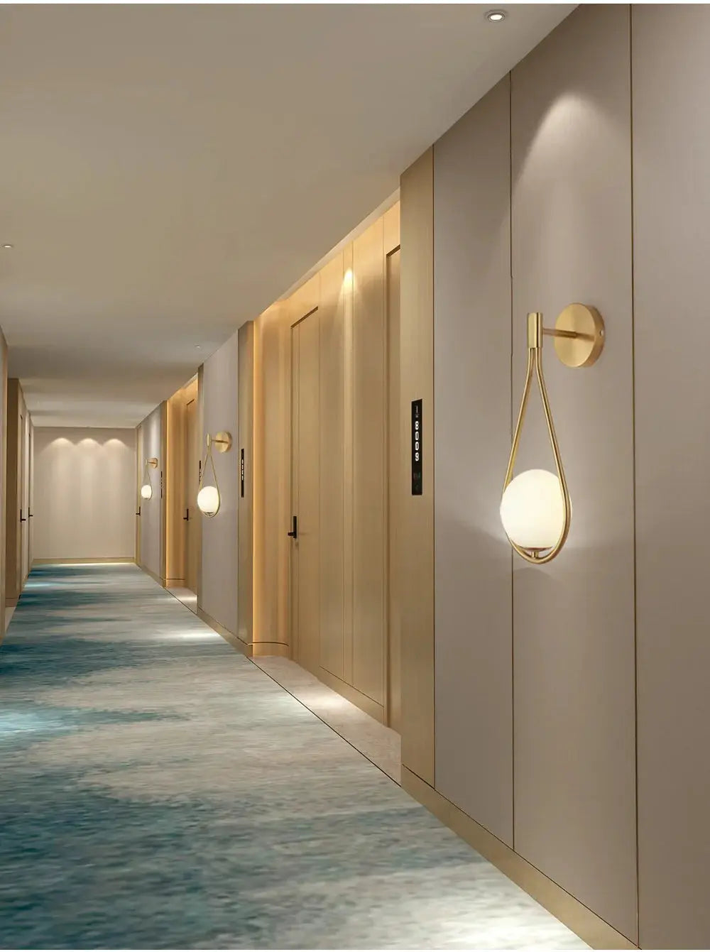 Nordic luxury glass-ball LED wall lamps in brass finish; frosted glass spheres along beige hallway.