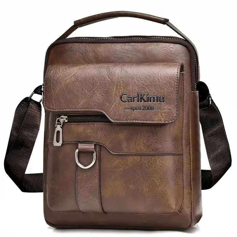 Daily Wear vintage PU leather messenger bag in brown with top handle, adjustable strap and front zip pocket (CarlKimu logo)