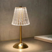 Crystal retro table lamp with gold brass base and faceted crystal shade, dimmable LED.