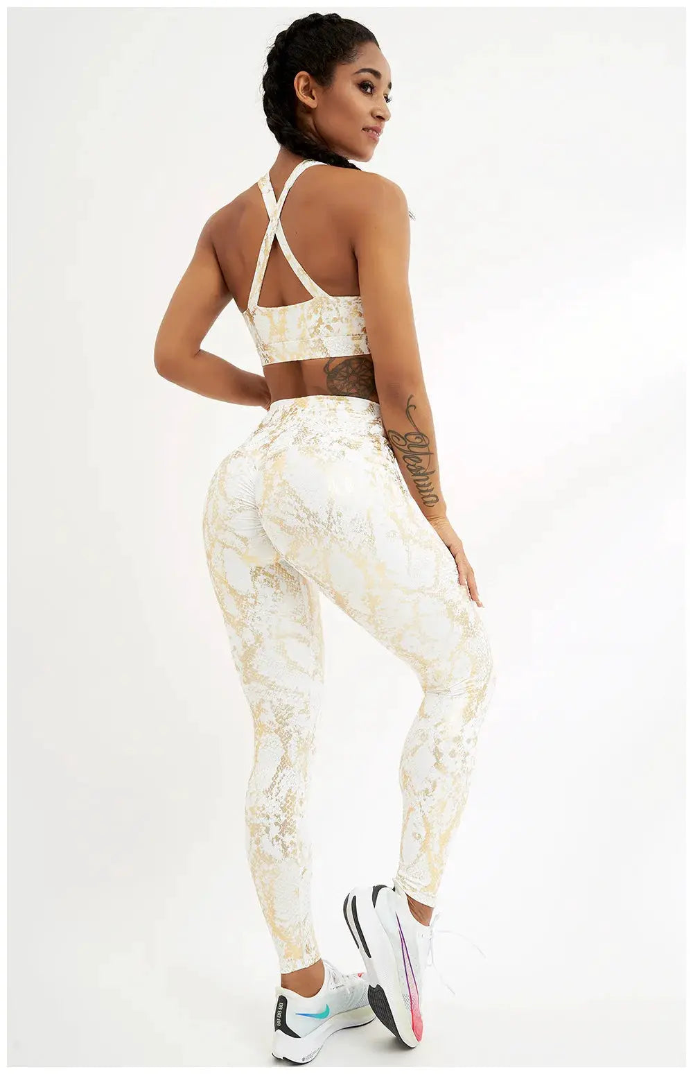 Snake-printed high-waist yoga pants in beige-gold pattern for women