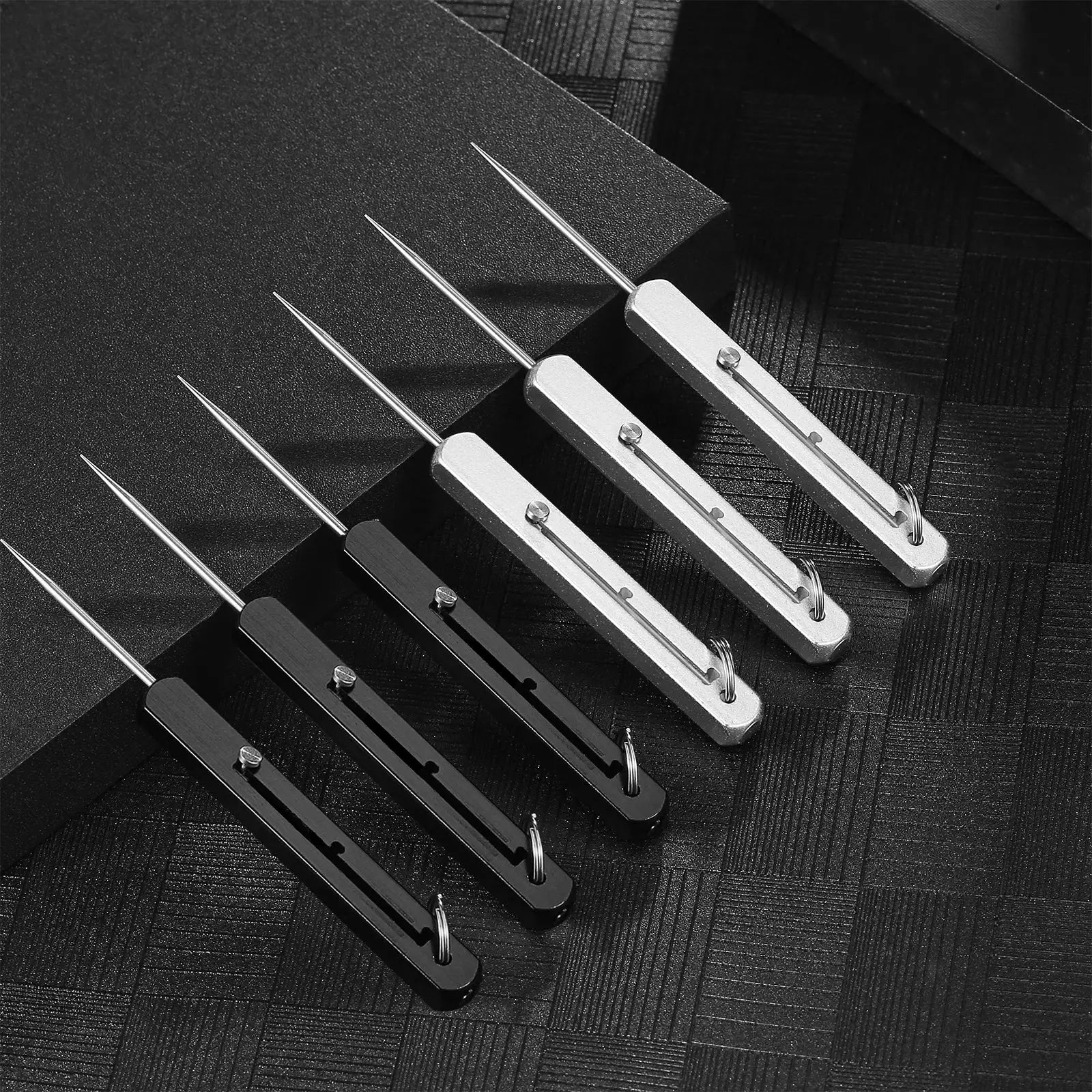 Portable titanium pocket toothpick holder with metal toothpicks in black and silver