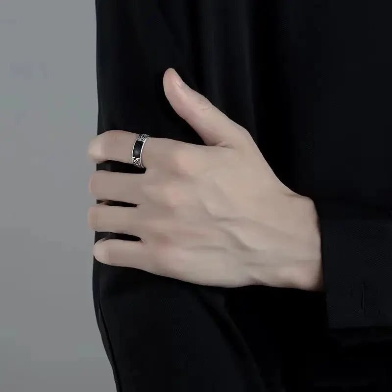 925 Sterling Silver men's ring with black zircon gem on model's hand