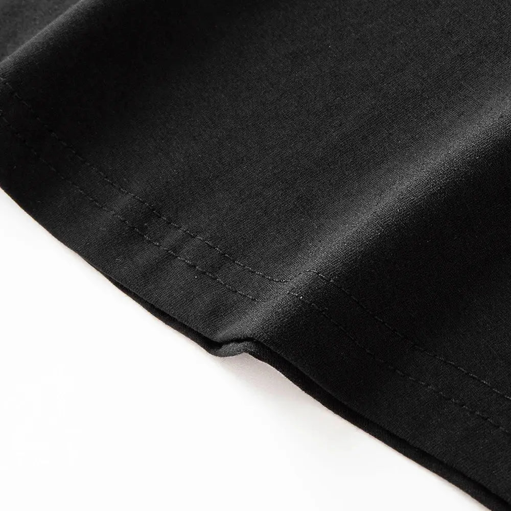 Black cotton short-sleeve T-shirt hem with neat stitching