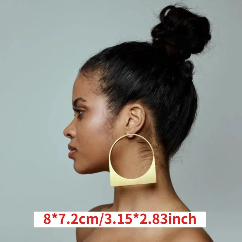African large hoop earring, gold-plated stainless steel with square bottom detail