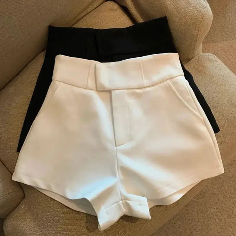 Women shorts, white high-waisted shorts with black shorts behind, Simples Market, two pairs