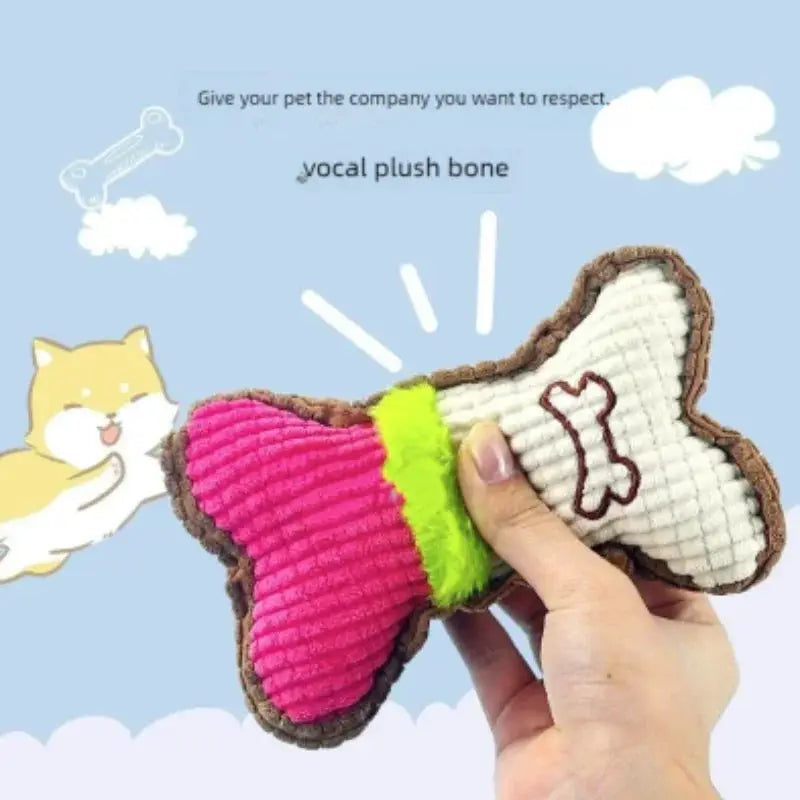 Simples Market plush dog bone squeaky toy for small/medium breeds; pink and white bone with lime center, brown trim.
