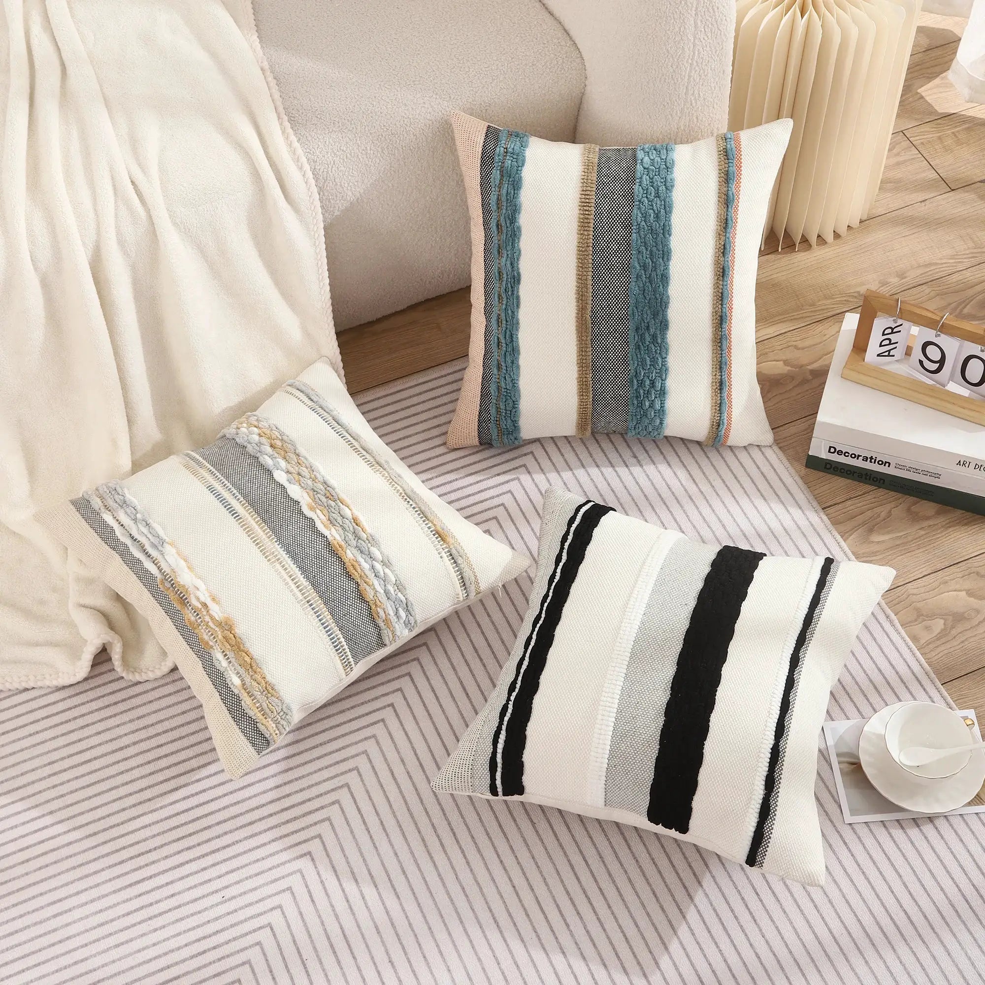 Boho striped 18x18 inch chenille pillow cover with cream base and teal stripes, shown with cushions
