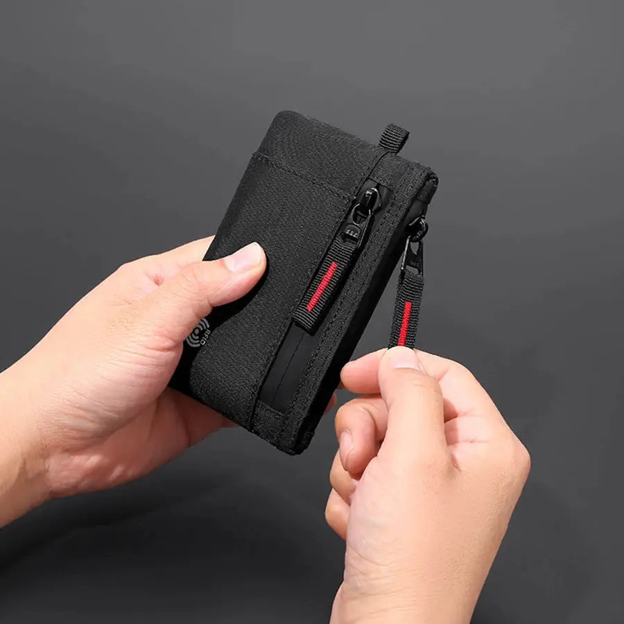 Credit card holder wallet by Simples Market in black nylon with dual-zip pockets and carabiner