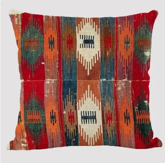 Bohemian linen cushion case by Simples Market with multicolor geometric tribal print.