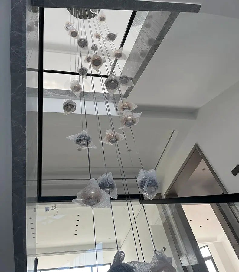 Simples Market modern LED pendant light chandelier with multiple hanging ring-style fixtures in living room