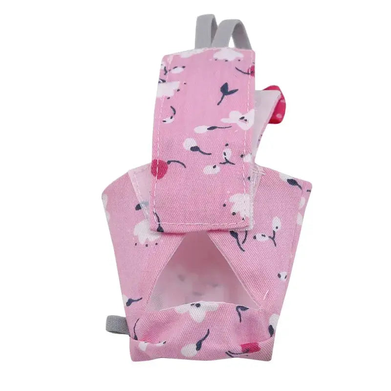 Parrot diaper in pink floral fabric for birds; washable flight suit by Simples Market