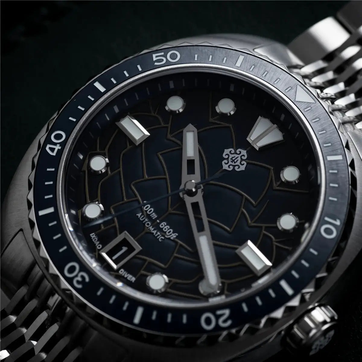 IXDAO IPOSE 2026 men's automatic diving watch with blue Poseidon pattern dial, stainless steel bezel and bracelet