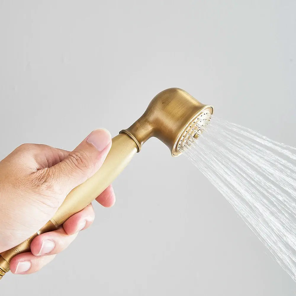 Antique brass handheld shower head with ceramic beige handle and 150cm hose