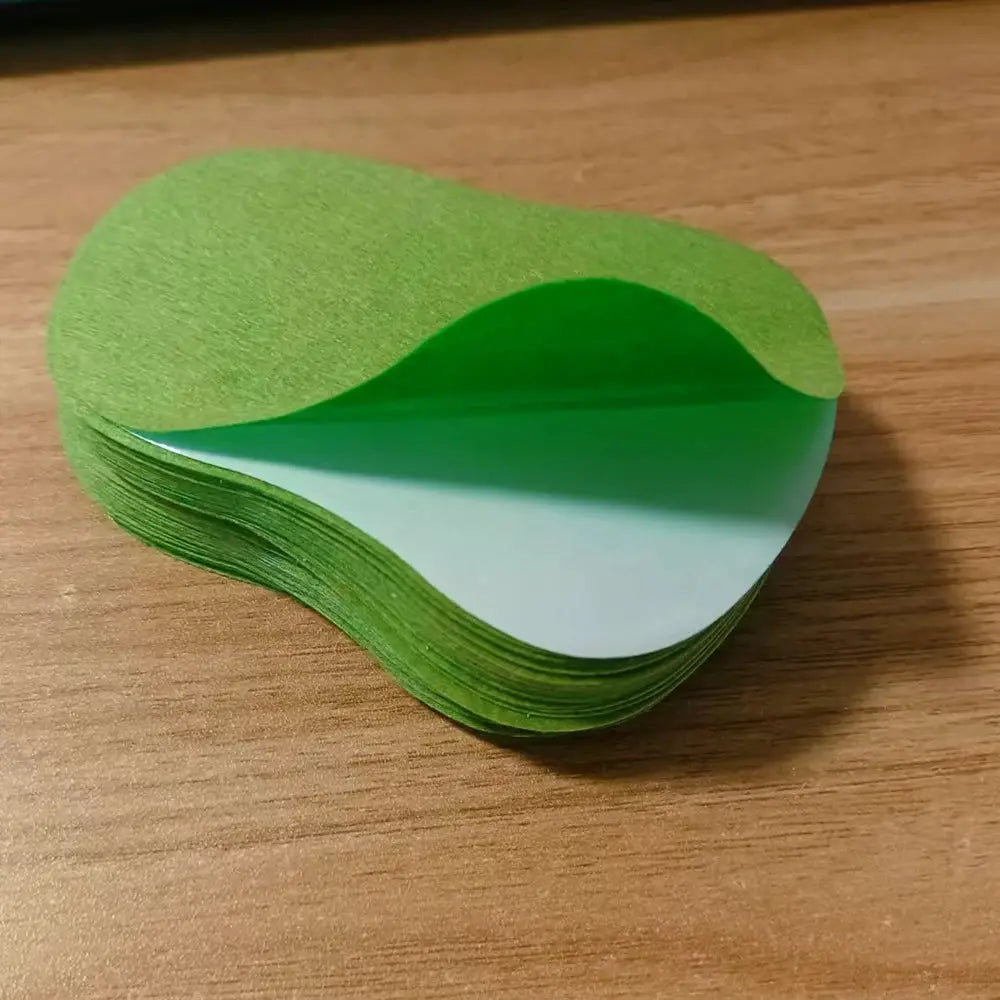 Simples Market 120pcs Six Types Of Heat Patches; stacked green heat patch sheets.