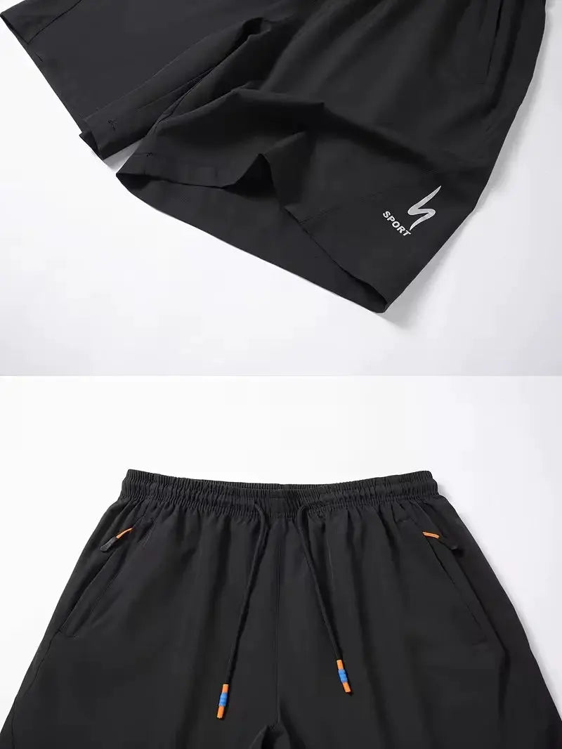 Men's black sports shorts with elastic waist, drawstring with orange/blue tips and side pockets