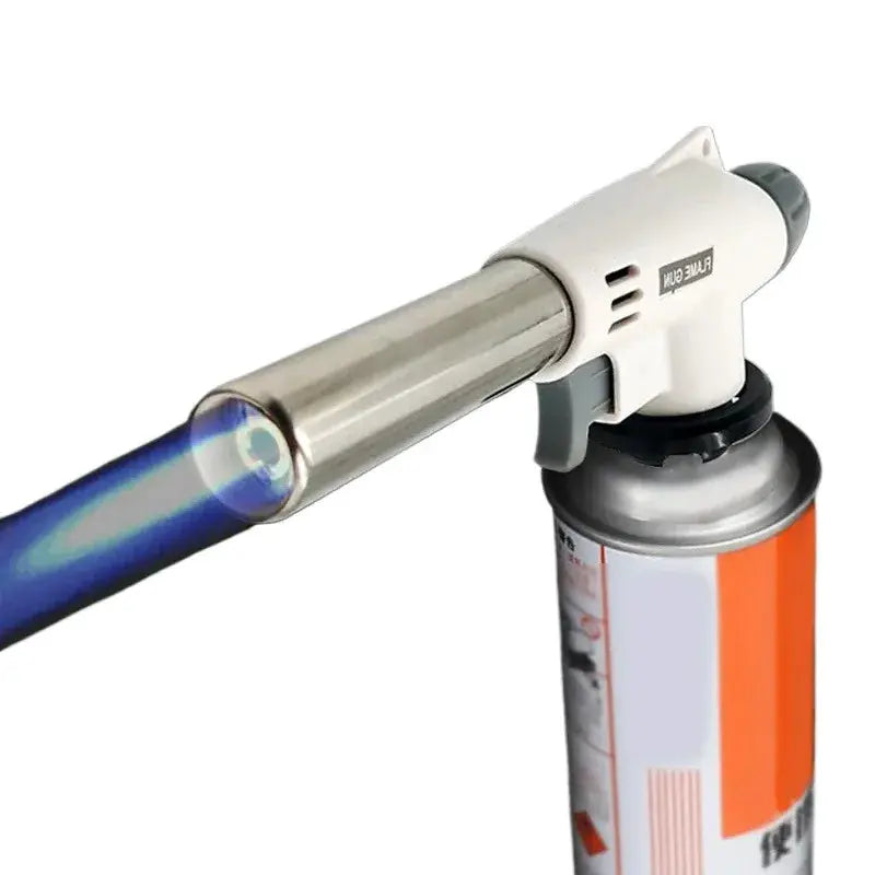 Multifunctional portable flame torch from Simples Market with white body and stainless steel nozzle on a butane canister