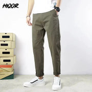 HIQOR men's olive cotton casual pants with rolled cuffs and a relaxed fit.