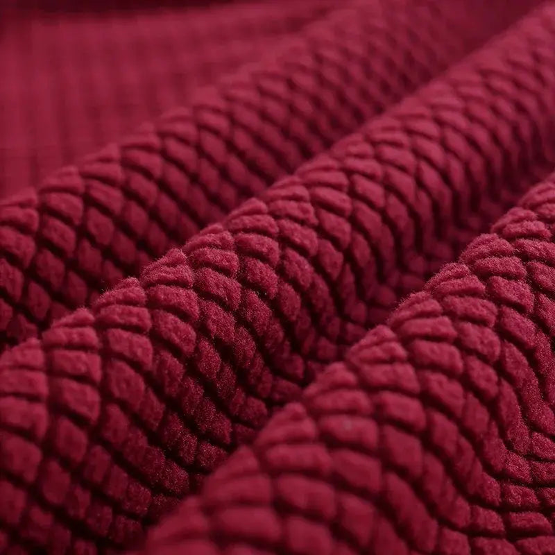 Bed headboard cover in burgundy plush fleece with thick braided texture