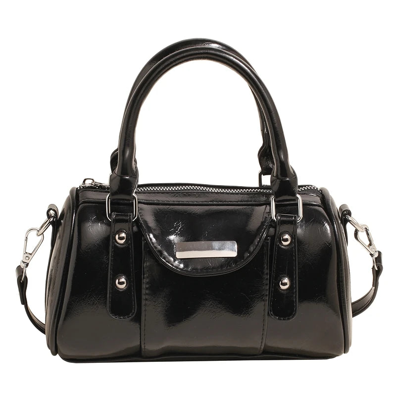 Mini top-handle bag by Simples Market, black patent leather with detachable shoulder strap