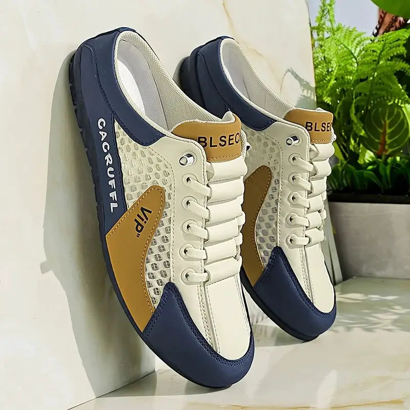 A pair of men's casual slip-on sneakers by Simples Market, navy-blue and beige with breathable mesh panels.