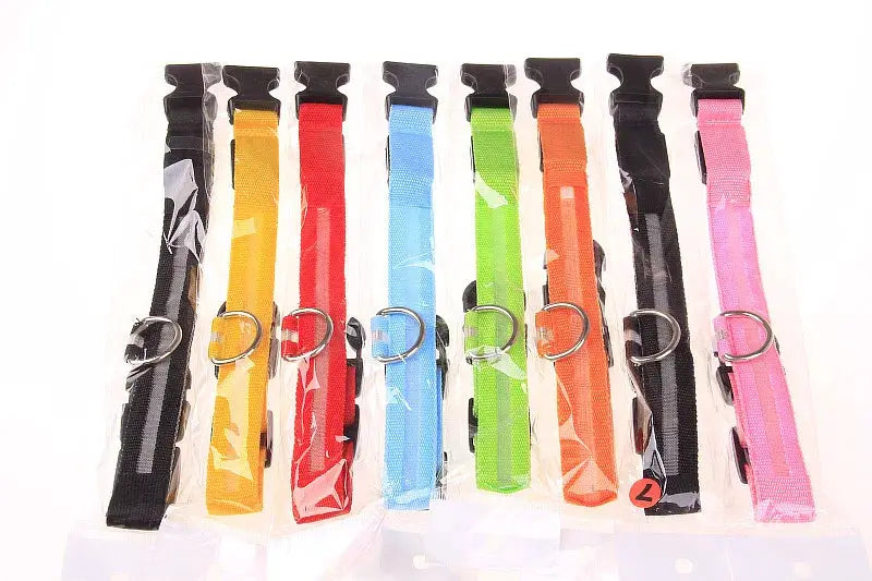 Nylon LED glow-in-the-dark dog collars in eight bright colors with metal D-rings