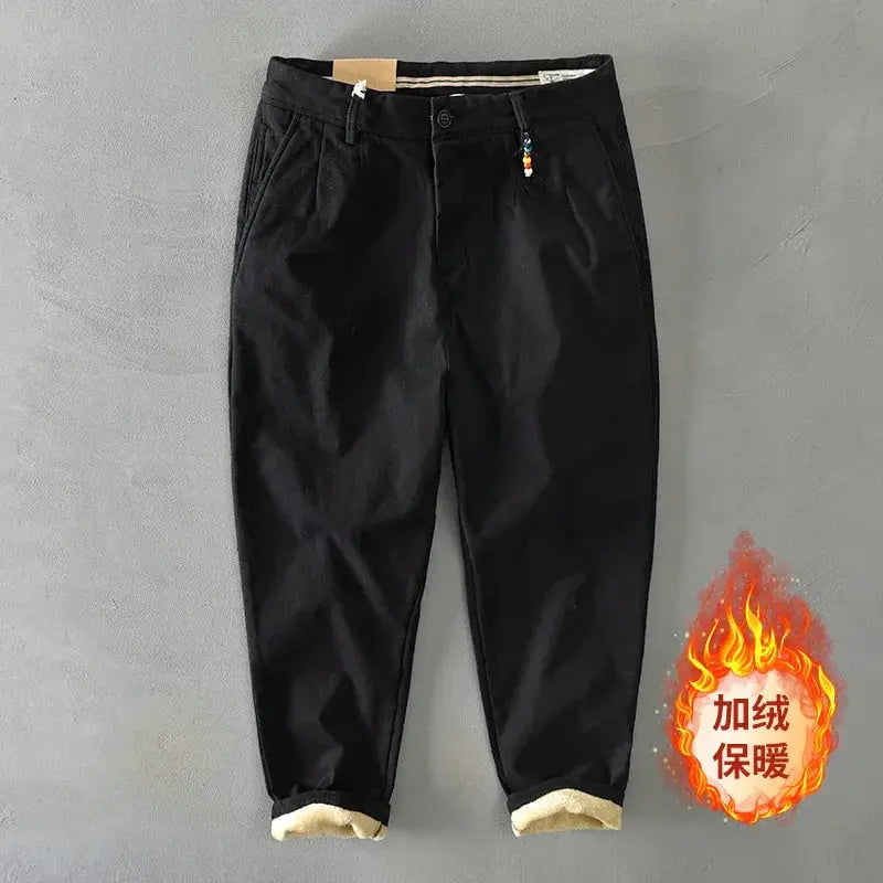 HIQOR 2025 men's winter pants, black cotton, loose casual safari style with pockets, fleece-lined cuffs.
