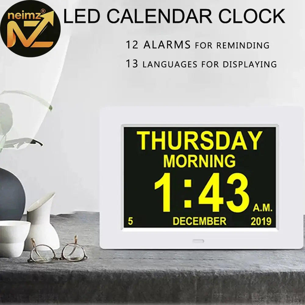 LED calendar clock with neimz logo by Simples Market, white frame, 12 alarms and 13-language display with yellow readout