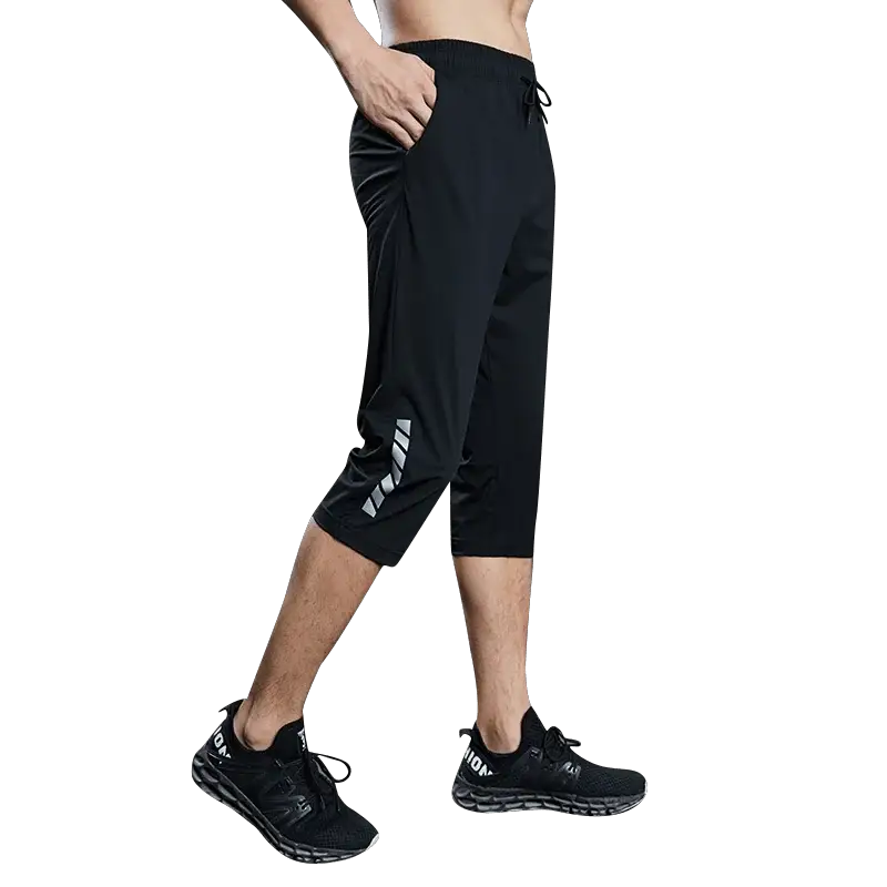 SONECHOKI men's black calf-length running pants with basketball print, featuring quick-dry fabric and a loose fit.