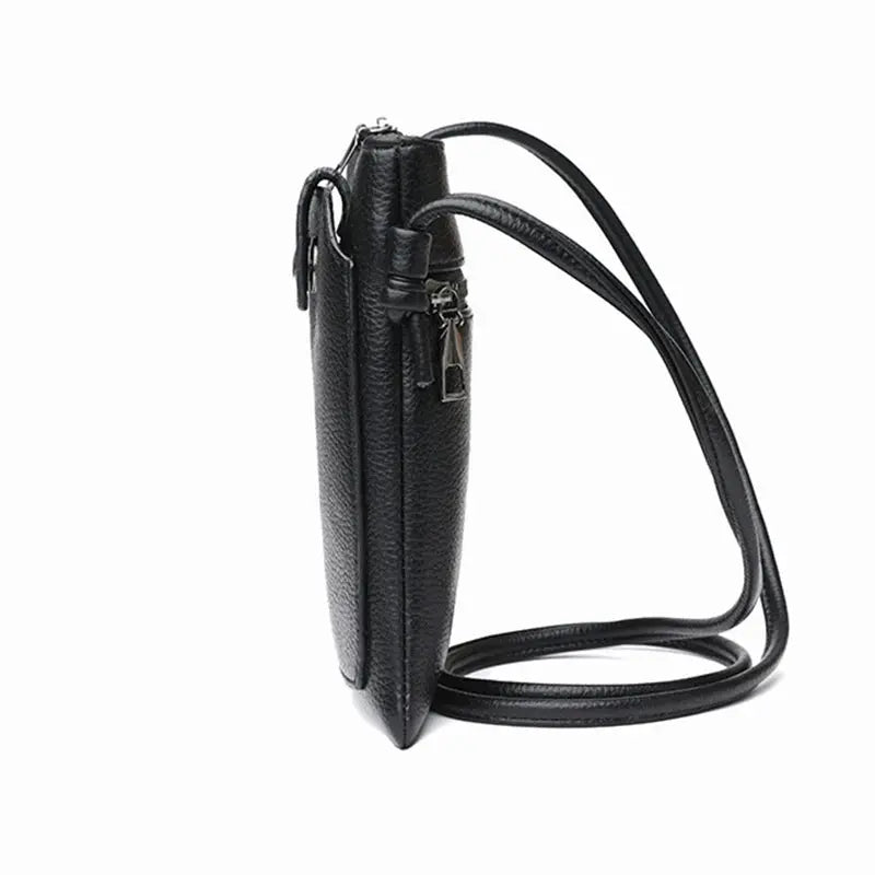 PU leather diagonal crossbody bag in black with dual compartments and long shoulder strap