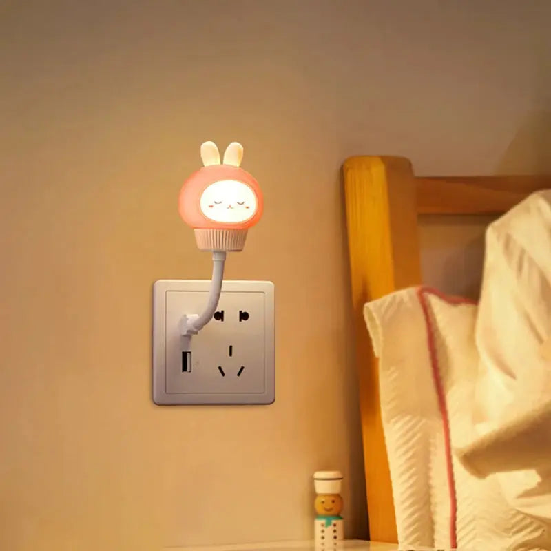 USB night light LED cartoon bunny lamp by Simples Market, pink plug-in wall light beside bed